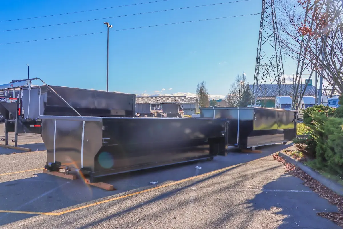 Roll-off dumpster ready for waste disposal at job site for Concrete Dumpster Rental in Krum